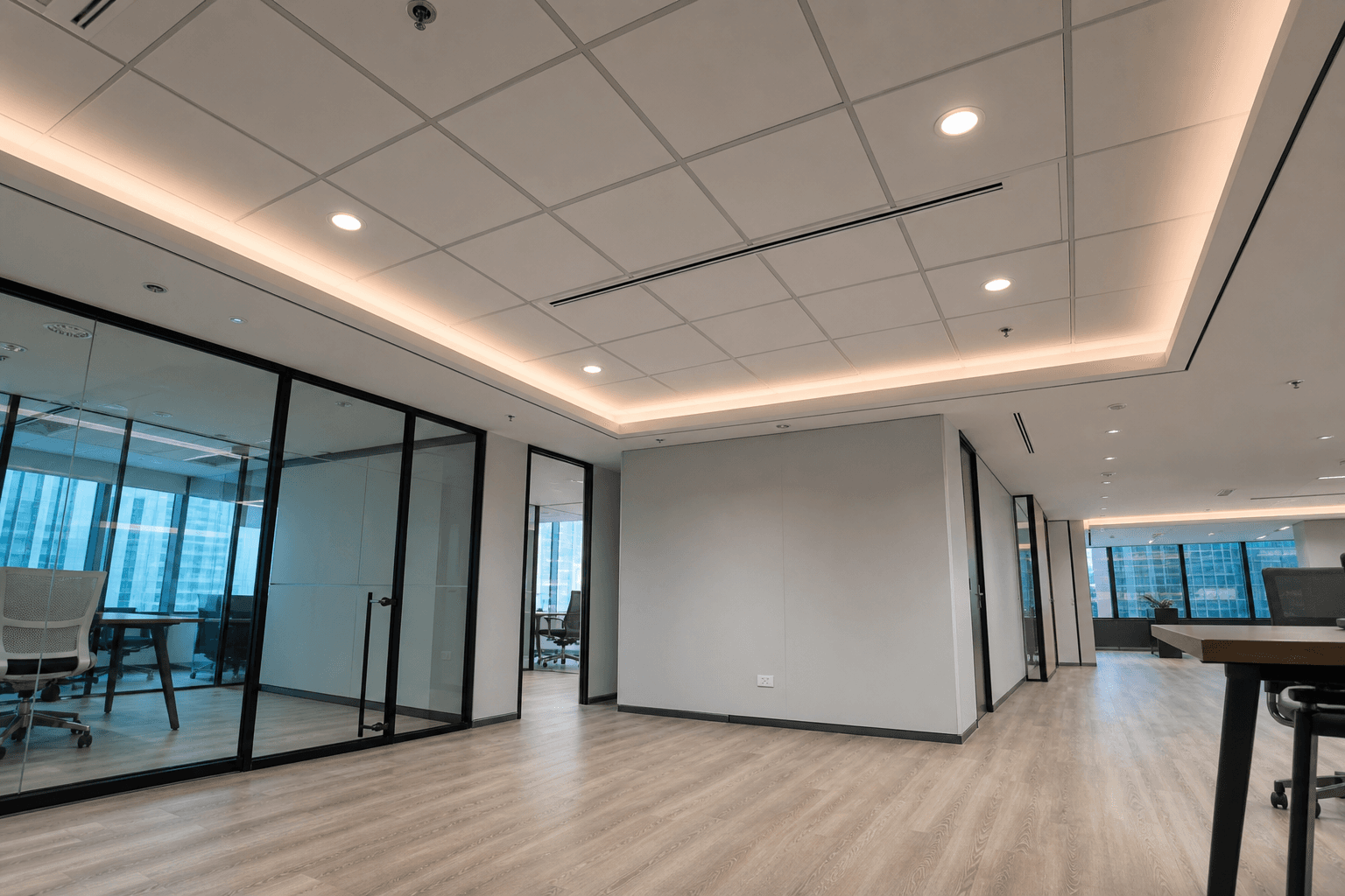 Office false ceiling with cove lighting and vinyl flooring in Singapore